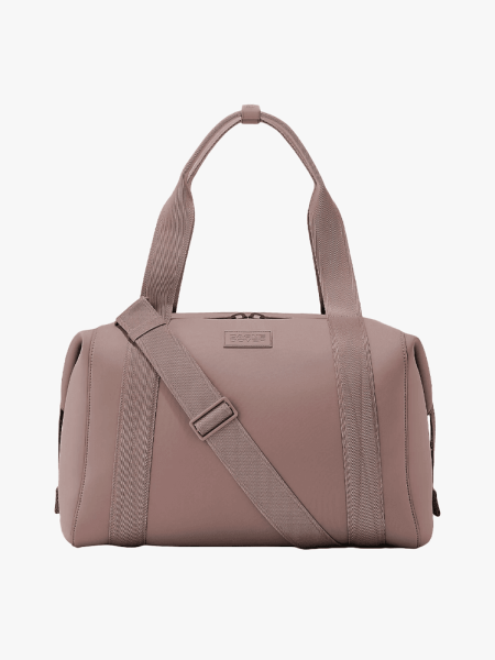 Dagne Dover Weekender Duffle Bag in branded component on a light gray background